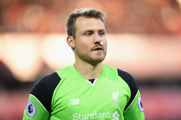 LIVERPOOL, ENGLAND - SEPTEMBER 10: Simon Mignolet of Liverpool looks on following an injury during the Premier League match between Liverpool and Leicester City at Anfield on September 10, 2016 in Liverpool, England.  (Photo by Michael Regan/Getty Images)