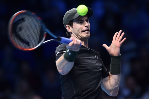 Britain's Andy Murray returns against Japan's Kei Nishikori during their round robin stage men's singles match on day four of the ATP World Tour Finals tennis tournament in London on November 16, 2016. / AFP / Glyn KIRK        (Photo credit should read GLYN KIRK/AFP/Getty Images)