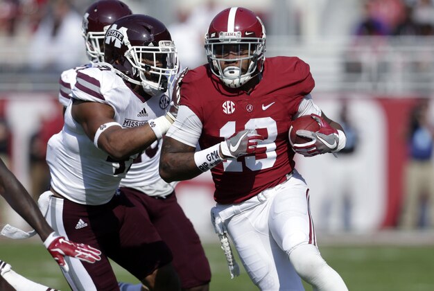 Nov 12, 2016; Tuscaloosa, AL, USA; Alabama Crimson Tide wide receiver ArDarius Stewart (13) carries the ball against Mississippi State Bulldogs  at Bryant-Denny Stadium. Mandatory Credit: Marvin Gentry-USA TODAY Sports
