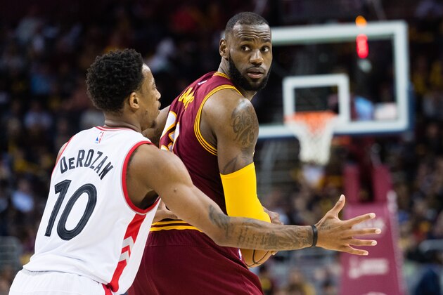 CLEVELAND, OH - NOVEMBER 15:  LeBron James #23 of the Cleveland Cavaliers looks for a pass while under pressure from DeMar DeRozan #10 of the Toronto Raptors during the second half at Quicken Loans Arena on November 15, 2016 in Cleveland, Ohio. The Cavaliers defeated the Raptors 121-117. NOTE TO USER: User expressly acknowledges and agrees that, by downloading and/or using this photograph, user is consenting to the terms and conditions of the Getty Images License Agreement. Mandatory copyright notice. (Photo by Jason Miller/Getty Images)