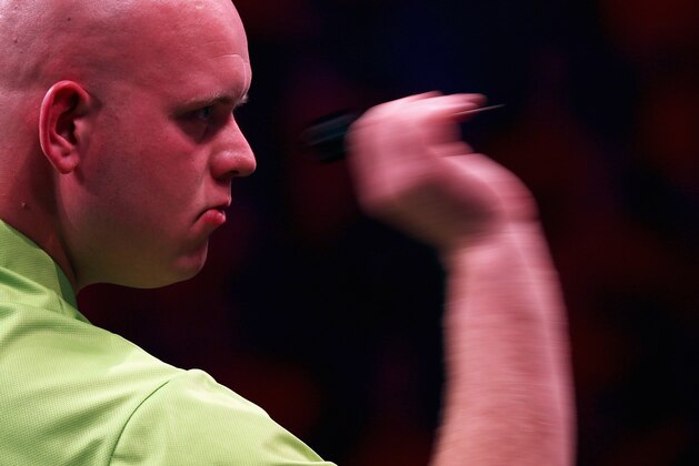 ROTTERDAM, NETHERLANDS - MAY 12:  Michael van Gerwen of the Netherlands plays a shot in his match against Phil 'The Power' Taylor of England during the Darts Betway Premier League Night 15 at Rotterdam Ahoy on May 12, 2016 in Rotterdam, .  (Photo by Dean Mouhtaropoulos/Getty Images)
