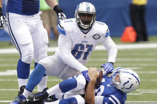 FILE - In this Sept. 11, 2016, file photo, Detroit Lions defensive end Kerry Hyder (61) sacks Indianapolis Colts quarterback Andrew Luck (12) during the first half of an NFL football game in Indianapolis. Hyder has made the most of his opportunity to replace defensive end Ezekiel Ansah. (AP Photo/Michael Conroy, File)