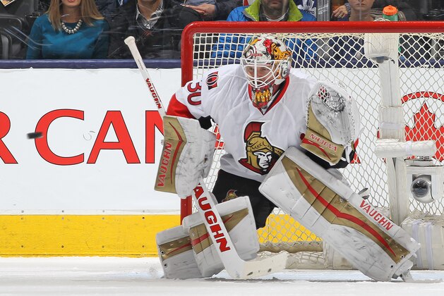 TORONTO, ON - MARCH 5:  Andrew Hammond #30 of the Ottawa Senators gets set to face a shot against the Toronto Maple Leafs during an NHL game at the Air Canada Centre on March 5,2016 in Toronto, Ontario, Canada. The Senators defeated the Maple Leafs 3-2. (Photo by Claus Andersen/Getty Images)