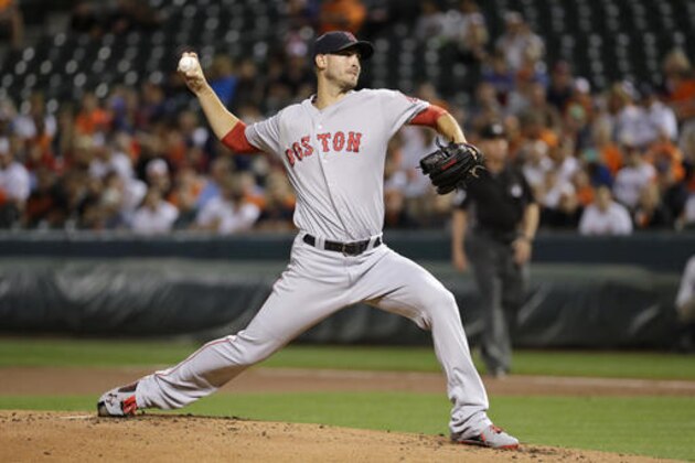 Boston Red Sox starting pitcher Rick Porcello throws to the Baltimore Orioles in the first inning of a baseball game in Baltimore, Monday, Sept. 19, 2016. (AP Photo/Patrick Semansky)