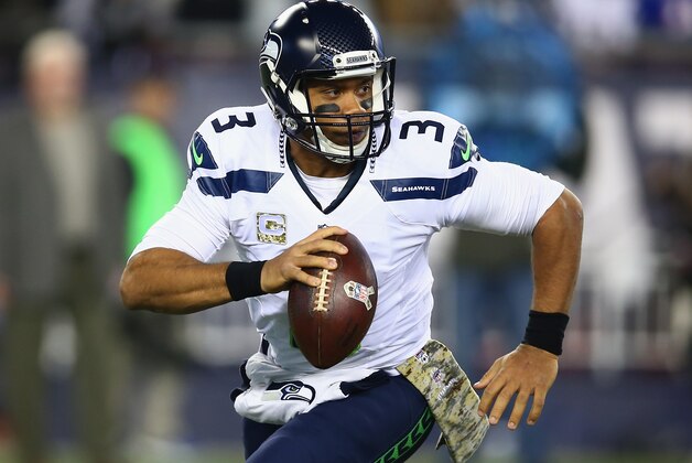 FOXBORO, MA - NOVEMBER 13:  Russell Wilson #3 of the Seattle Seahawks looks to throw the ball during the first quarter of a game against the New England Patriots at Gillette Stadium on November 13, 2016 in Foxboro, Massachusetts.  (Photo by Adam Glanzman/Getty Images)