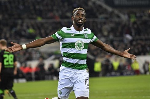 Celtic's Moussa Dembele celebrates after scoring a penalty during the Champions League group C soccer match between Borussia Moenchengladbach and Celtic FC in Moenchengladbach, Germany, Tuesday, Nov. 1, 2016. (AP Photo/Martin Meissner)