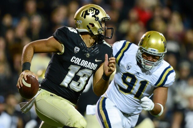 BOULDER, CO - NOVEMBER 3:  quarterback Sefo Liufau #13 of the Colorado Buffaloes scrambles against the UCLA Bruins in the third quarter at Folsom Field on November 3, 2016 in Boulder, Colorado.  (Photo by Dustin Bradford/Getty Images)