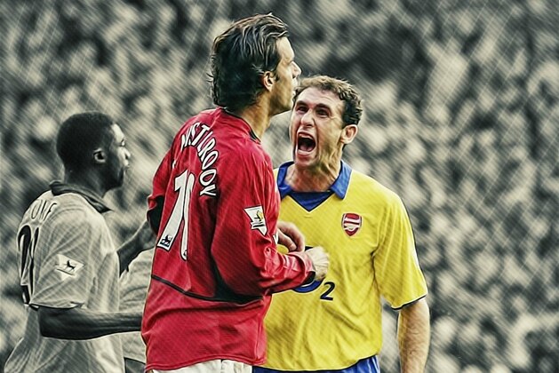 MANCHESTER, ENGLAND - SEPTEMBER 21:  Martin Keown of Arsenal shows his feelings at Ruud Van Nistelrooy of Man Utd after Van Nistelrooy missed his penalty during the FA Barclaycard Premiership match between Manchester United and Arsenal at Old Trafford on September 21, 2003 in Manchester, England. (Photo by Shaun Botterill/Getty Images)