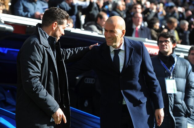 MADRID, SPAIN - FEBRUARY 27:  Manager Diego Simeone of Club Atletico de Madrid greets Real Madrid manager Zinedine Zidane during the La Liga match between Real Madrid CF and Club Atletico de Madrid at Estadio Santiago Bernabeu on February 27, 2016 in Madrid, Spain.  (Photo by Denis Doyle/Getty Images)