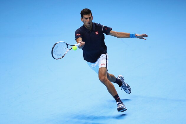 LONDON, ENGLAND - NOVEMBER 17:  Novak Djokovic of Serbia plays a forehand in his men's singles match against David Goffin of Belgium on day five of the ATP World Tour Finals at O2 Arena on November 17, 2016 in London, England.  (Photo by Clive Brunskill/Getty Images)