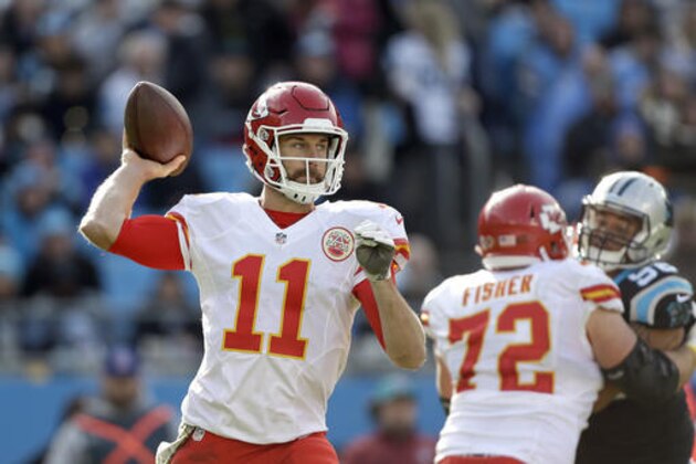 Kansas City Chiefs' Alex Smith (11) aims a pass against the Carolina Panthers during the second half of an NFL football game in Charlotte, N.C., Sunday, Nov. 13, 2016. The Chiefs won 20-17. (AP Photo/Bob Leverone)