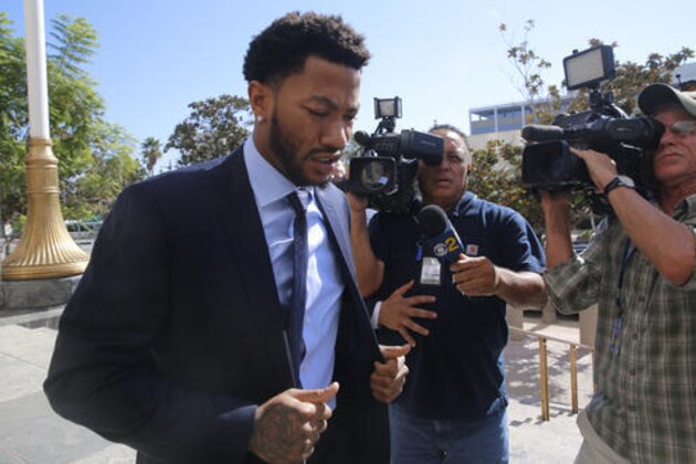 New York Knicks basketball player Derrick Rose arrives at U.S. District Court in downtown Los Angeles on Thursday, Oct. 6, 2016. A six-woman, two-man jury has been seated in the trial of a civil lawsuit brought against Derrick Rose by an ex-girlfriend who alleges the NBA star and two of his friends drugged and sexually assaulted her. (AP Photo/Damian Dovarganes)