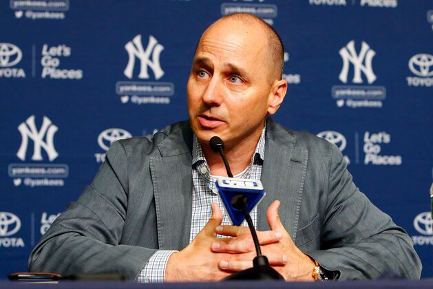 NEW YORK, NY - AUGUST 07:  New York Yankees general manager Brian Cashman speaks during a news conference on August 7, 2016 at Yankee Stadium in the Bronx borough of New York City.  (Photo by Jim McIsaac/Getty Images)