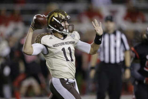 Western Michigan quarterback Zach Terrell (11) throws against Ball State during the first half of an NCAA college football game in Muncie, Ind., Tuesday, Nov. 1, 2016. (AP Photo/Michael Conroy)