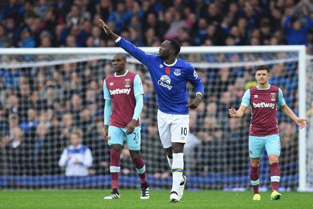 Everton's Belgian striker Romelu Lukaku celebrates after scoring the opening goal of the English Premier League football match between Everton and West Ham United at Goodison Park in Liverpool, north west England on October 30, 2016. / AFP / PAUL ELLIS / RESTRICTED TO EDITORIAL USE. No use with unauthorized audio, video, data, fixture lists, club/league logos or 'live' services. Online in-match use limited to 75 images, no video emulation. No use in betting, games or single club/league/player publications.  /         (Photo credit should read PAUL ELLIS/AFP/Getty Images)