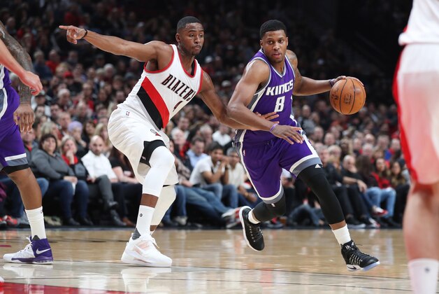 Nov 11, 2016; Portland, OR, USA;  Sacramento Kings forward Rudy Gay (8) drives on Portland Trail Blazers forward Maurice Harkless (4) in the first half at Moda Center at the Rose Quarter. Mandatory Credit: Jaime Valdez-USA TODAY Sports