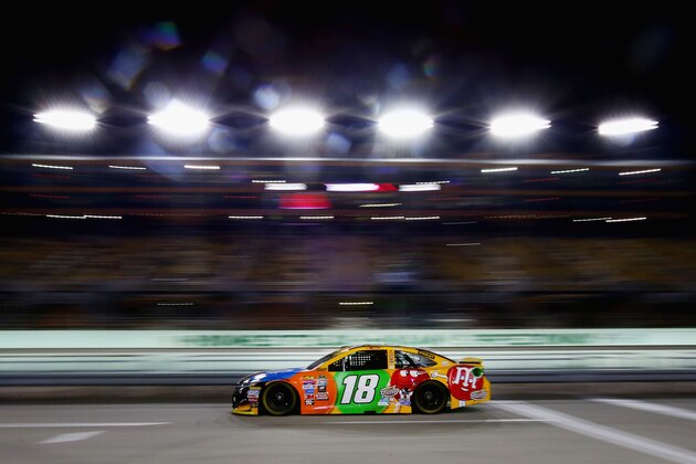 HOMESTEAD, FL - NOVEMBER 18:  Kyle Busch, driver of the #18 M&M's Toyota, drives during qualifying for the NASCAR Sprint Cup Series Ford EcoBoost 400 at Homestead-Miami Speedway on November 18, 2016 in Homestead, Florida.  (Photo by Sarah Crabill/Getty Images)