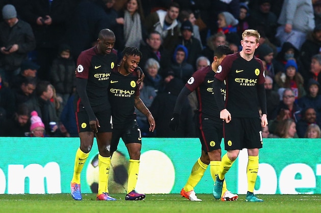 LONDON, ENGLAND - NOVEMBER 19:  Yaya Toure of Manchester City (L) celebrates scoring his sides first goal with Raheem Sterling of Manchester City (C) during the Premier League match between Crystal Palace and Manchester City at Selhurst Park on November 19, 2016 in London, England.  (Photo by Charlie Crowhurst/Getty Images)
