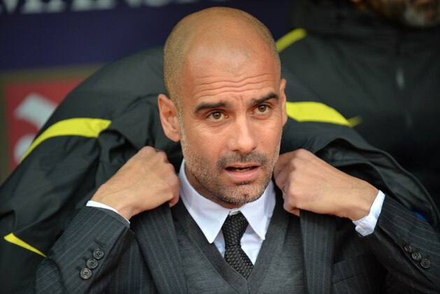 Manchester City's Spanish manager Pep Guardiola arrives for the English Premier League football match between Crystal Palace and Manchester City at Selhurst Park in south London on November 19, 2016. / AFP / OLLY GREENWOOD / RESTRICTED TO EDITORIAL USE. No use with unauthorized audio, video, data, fixture lists, club/league logos or 'live' services. Online in-match use limited to 75 images, no video emulation. No use in betting, games or single club/league/player publications.  /         (Photo credit should read OLLY GREENWOOD/AFP/Getty Images)
