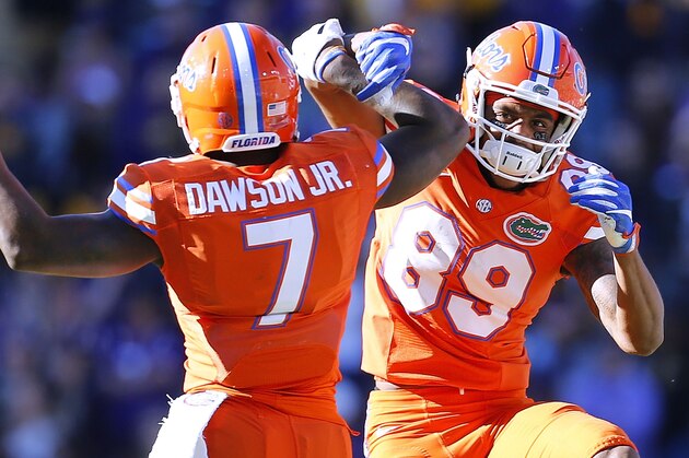 BATON ROUGE, LA - NOVEMBER 19: Tyrie Cleveland #89 of the Florida Gators and Duke Dawson #7 celebrate after Florida recovered a fumble during the second half of a game against the LSU Tigers at Tiger Stadium on November 19, 2016 in Baton Rouge, Louisiana.  (Photo by Jonathan Bachman/Getty Images)