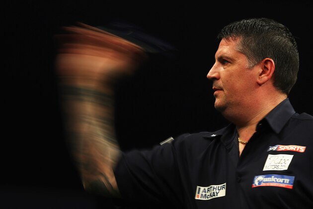 ROTTERDAM, NETHERLANDS - MAY 12:  Gary Anderson of Scotland plays a shot in his match against Adrian Lewis of England during the Darts Betway Premier League Night 15 at Rotterdam Ahoy on May 12, 2016 in Rotterdam, .  (Photo by Dean Mouhtaropoulos/Getty Images)
