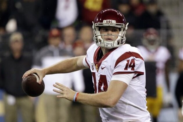 Southern California quarterback Sam Darnold in action against Washington in an NCAA college football game Saturday, Nov. 12, 2016, in Seattle. USC won 26-13. (AP Photo/Elaine Thompson)