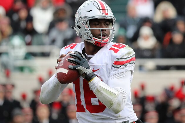 EAST LANSING, MI - NOVEMBER 19: J.T. Barrett #16 of the Ohio State Buckeyes drops back to pass during the fourth quarter of the game against the Michigan State Spartans at Spartan Stadium on November 19, 2016 in East Lansing, Michigan. Ohio State defeated Michigan State 17-16. (Photo by Leon Halip/Getty Images)