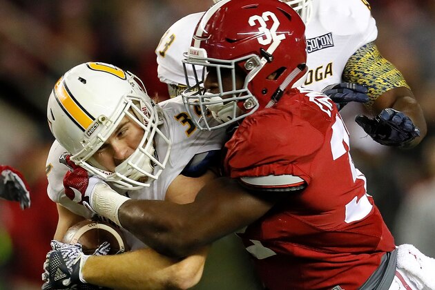 TUSCALOOSA, AL - NOVEMBER 19:  Rashaan Evans #32 of the Alabama Crimson Tide tackles Derrick Craine #34 of the Chattanooga Mocs at Bryant-Denny Stadium on November 19, 2016 in Tuscaloosa, Alabama.  (Photo by Kevin C. Cox/Getty Images)