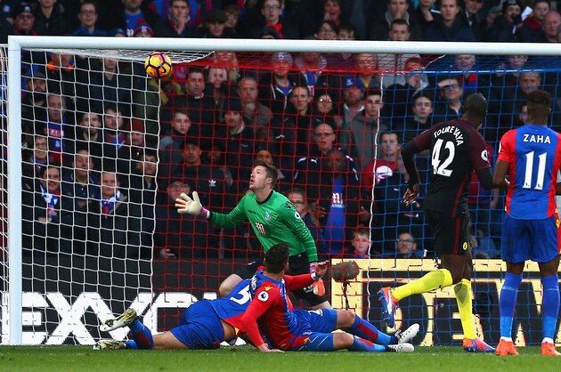LONDON, ENGLAND - NOVEMBER 19: Yaya Toure of Manchester City (C) scores his sides first goal during the Premier League match between Crystal Palace and Manchester City at Selhurst Park on November 19, 2016 in London, England.  (Photo by Charlie Crowhurst/Getty Images)