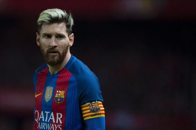 Barcelona's Argentinian forward Lionel Messi looks on during the Spanish league football match Sevilla FC vs FC Barcelona at the Ramon Sanchez Pizjuan stadium in Sevilla on November 6, 2016. / AFP / JORGE GUERRERO        (Photo credit should read JORGE GUERRERO/AFP/Getty Images)
