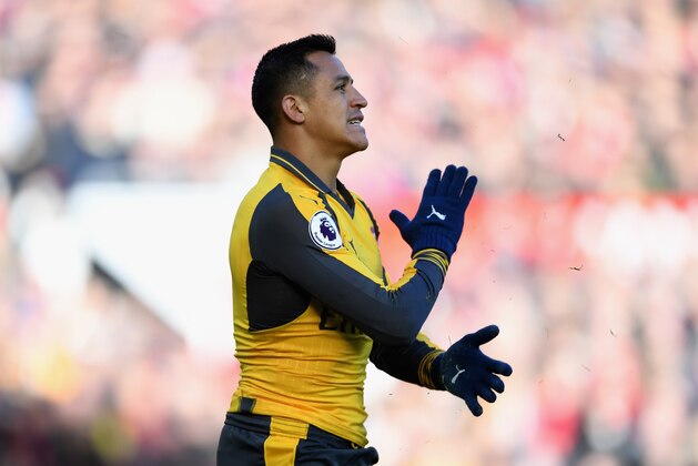 MANCHESTER, ENGLAND - NOVEMBER 19: Alexis Sanchez of Arsenal reacts  during the Premier League match between Manchester United and Arsenal at Old Trafford on November 19, 2016 in Manchester, England.  (Photo by Shaun Botterill/Getty Images)