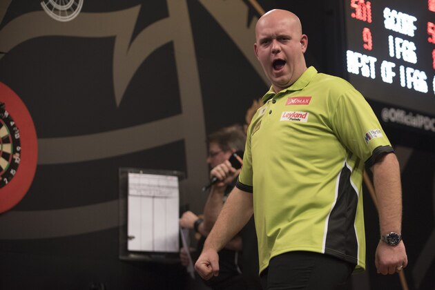 WOLVERHAMPTON, ENGLAND- NOVEMBER 20: Michael van Gerwen of the Netherlands celebrates during his semi-final match against Peter Wright of Scotland during the SINGHA Beer Grand Slam of Darts at Wolverhampton Civic Hall on November 20, 2016 in Wolverhampton, England (Photo by Nathan Stirk/Getty Images).
