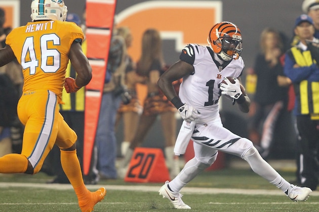 CINCINNATI, OH - SEPTEMBER 29:  Neville Hewitt #46 of the Miami Dolphins chases after Brandon LaFell #11 of the Cincinnati Bengals during the first quarter at Paul Brown Stadium on September 29, 2016 in Cincinnati, Ohio. (Photo by John Grieshop/Getty Images)