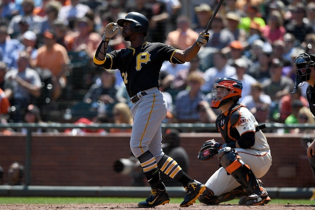 SAN FRANCISCO, CA - AUGUST 17:  Andrew McCutchen #22 of the Pittsburgh Pirates swings and watches the flight of his ball as he hits a two-run homer against the San Francisco Giants in the top of the fifth inning at AT&T Park on August 17, 2016 in San Francisco, California.  (Photo by Thearon W. Henderson/Getty Images)