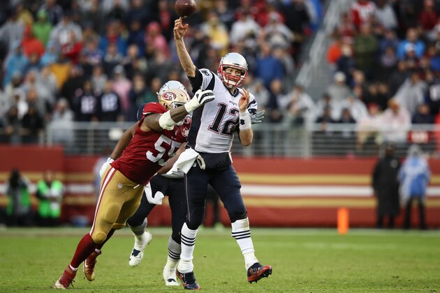 SANTA CLARA, CA - NOVEMBER 20:  Tom Brady #12 of the New England Patriots throws a 56-yard touchdown pass to Malcolm Mitchell #19 against the San Francisco 49ers during their NFL game at Levi's Stadium on November 20, 2016 in Santa Clara, California.  (Photo by Ezra Shaw/Getty Images)