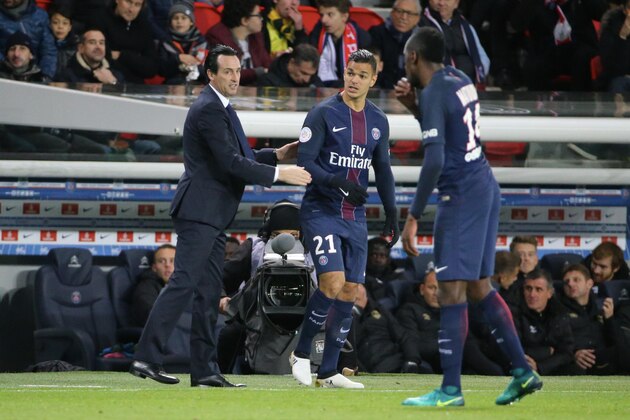 PARIS, FRANCE - NOVEMBER 19:  Head coach Unai Emery and Hatem Ben Arfa of Paris Saint-Germain react during the French Ligue 1 match between Paris Saint-Germain and FC Nantes at Parc des Princes on november 19, 2016 in Paris, France.  (Photo by Xavier Laine/Getty Images)