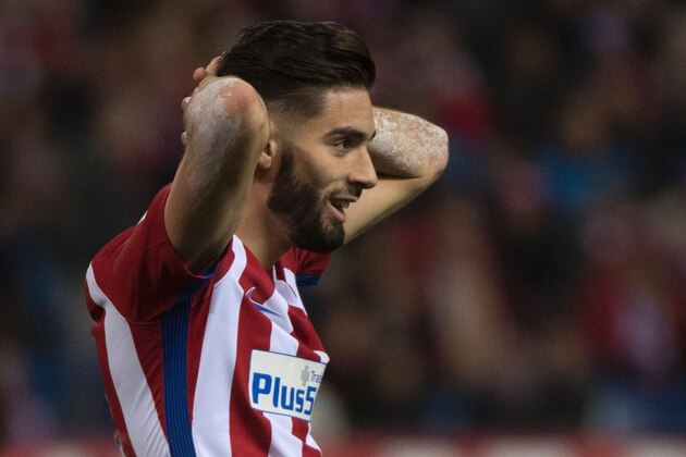 Atletico Madrid's Belgian midfielder Yannick Ferreira Carrasco reacts after being defeated at the end of the Spanish league football match Club Atletico de Madrid vs Real Madrid CF at the Vicente Calderon stadium in Madrid, on November 19, 2016. / AFP / CURTO DE LA TORRE        (Photo credit should read CURTO DE LA TORRE/AFP/Getty Images)