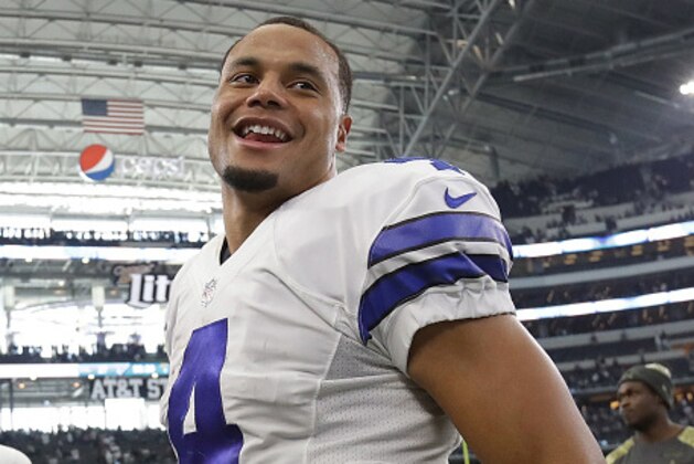ARLINGTON, TX - NOVEMBER 20:  Dak Prescott #4 of the Dallas Cowboys walks off the field after a 27-17 win against the Baltimore Ravens at AT&T Stadium on November 20, 2016 in Arlington, Texas.  (Photo by Ronald Martinez/Getty Images)
