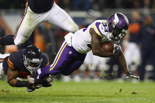 CHICAGO, IL - OCTOBER 31:  Ronnie Hillman #33 of the Minnesota Vikings is tackled during the second half against the Chicago Bears at Soldier Field on October 31, 2016 in Chicago, Illinois.  (Photo by Elsa/Getty Images)