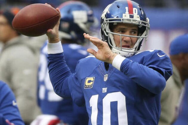 New York Giants quarterback Eli Manning warms up before playing against the Chicago Bears in an NFL football game, Sunday, Nov. 20, 2016, in East Rutherford, N.J. (AP Photo/Seth Wenig)