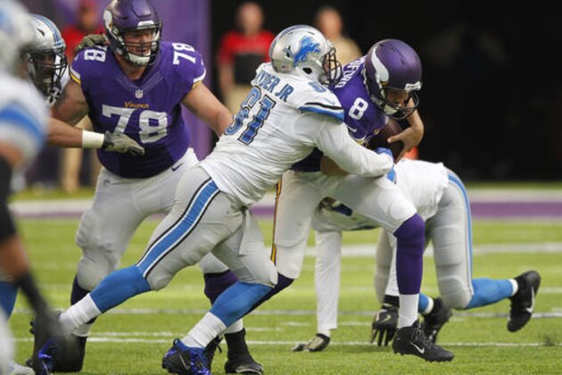 FILE - In this Nov. 6, 2016, file photo, Minnesota Vikings quarterback Sam Bradford (8) is sacked by Detroit Lions defensive end Kerry Hyder, left, during the second half of an NFL football game, in Minneapolis. Overshadowed by the injuries and ineffectiveness on Minnesota's offense has been a recent return to ordinary by a Vikings defense that was dominant over the first five games.   (AP Photo/Andy Clayton-King, File)