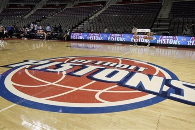The Detroit Pistons logo on the basketball court before basketball game between the Pistons and the Milwaukee Bucks at The Palace Friday, April 8, 2011, in Auburn Hills, Mich. The Pistons announced Friday that billionaire California investor Tom Gores has agreed to buy the struggling NBA franchise. (AP Photo/Duane Burleson)