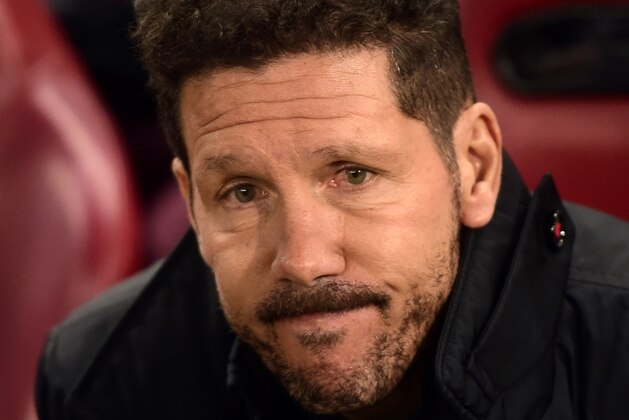 Atletico Madrid's Argentinian coach Diego Simeone looks on prior to the Spanish league football match Club Atletico de Madrid vs Real Madrid CF at the Vicente Calderon stadium in Madrid, on November 19, 2016. / AFP / PIERRE-PHILIPPE MARCOU        (Photo credit should read PIERRE-PHILIPPE MARCOU/AFP/Getty Images)