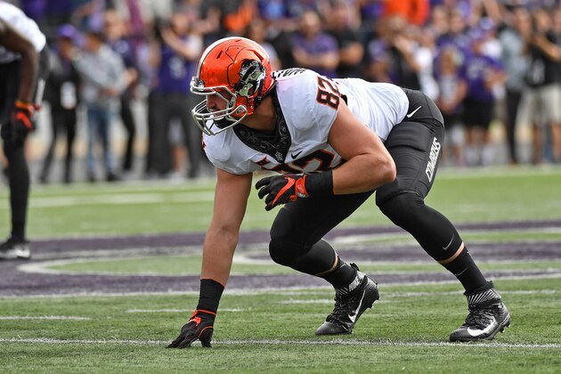 MANHATTAN, KS - NOVEMBER 05:  Defensive end Cole Walterscheid #82 of the Oklahoma State Cowboys gets set on defense against the Kansas State Wildcats during the first half on November 5, 2016 at Bill Snyder Family Stadium in Manhattan, Kansas.  (Photo by Peter G. Aiken/Getty Images)