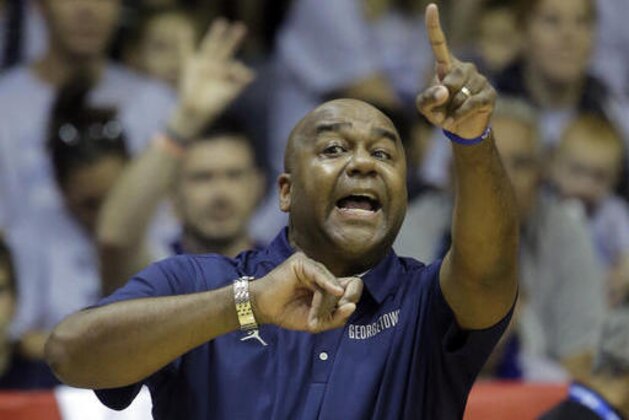Georgetown head coach John Thompson III shouts to his team in the second half during an NCAA college basketball game against Oregon in the Maui Invitational, Monday, Nov. 21, 2016, in Lahaina, Hawaii. (AP Photo/Rick Bowmer)