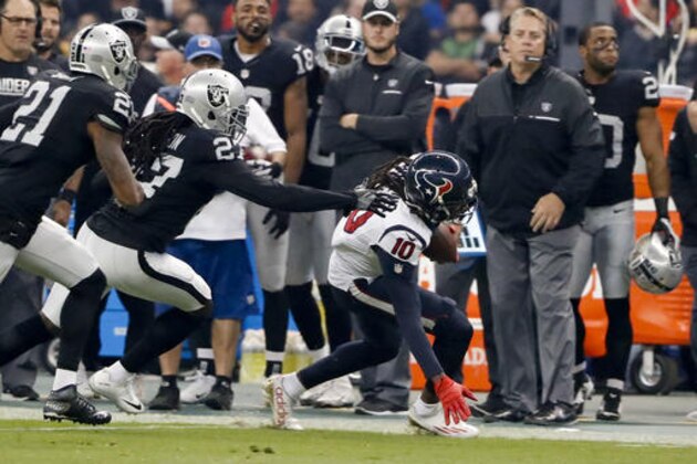 Houston Texans wide receiver DeAndre Hopkins (10) steps out of bounds as he runs during the first half of an NFL football game against the Oakland Raiders Monday, Nov. 21, 2016, in Mexico City. (AP Photo/Eduardo Verdugo)