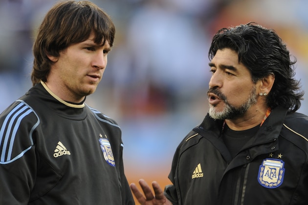 Argentina's coach Diego Maradona (R) speaks to Argentina's striker Lionel Messi prior the 2010 World Cup quarter-final match Argentina vs. Germany on July 3, 2010 at Green Point stadium in Cape Town.  NO PUSH TO MOBILE / MOBILE USE SOLELY WITHIN EDITORIAL ARTICLE -   AFP PHOTO / JAVIER SORIANO (Photo credit should read JAVIER SORIANO/AFP/Getty Images)