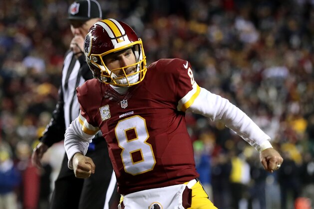 LANDOVER, MD - NOVEMBER 20: Quarterback Kirk Cousins #8 of the Washington Redskins celebrates after teammate running back Rob Kelley #32 (not pictured) scores a fourth quarter touchdown against the Green Bay Packers at FedExField on November 20, 2016 in Landover, Maryland. (Photo by Rob Carr/Getty Images)