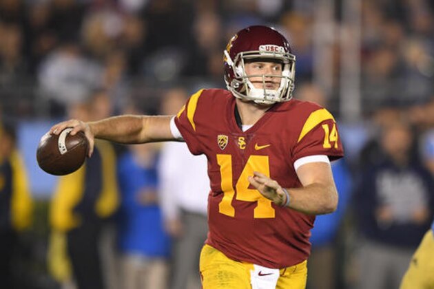 Southern California quarterback Sam Darnold passes during the first half of an NCAA college football game against UCLA, Saturday, Nov. 19, 2016, in Pasadena, Calif. (AP Photo/Mark J. Terrill)