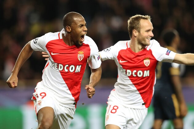 Monaco's French defender Djibril Sidibe (L) celebrates with Monaco's French forward Valere Germain after scoring their first goal during the UEFA Champions League group E football match AS Monaco and Tottenham Hotspur FC at the Louis II stadium in Monaco on November 22, 2016. / AFP / Valery HACHE        (Photo credit should read VALERY HACHE/AFP/Getty Images)